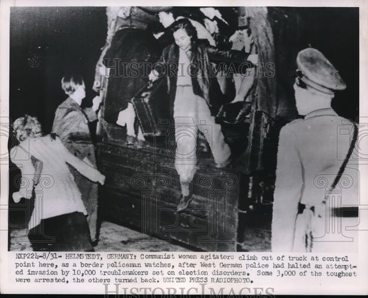 1953 Press Photo Communist Woman agitators climb out the truck in Germany. - Historic Images