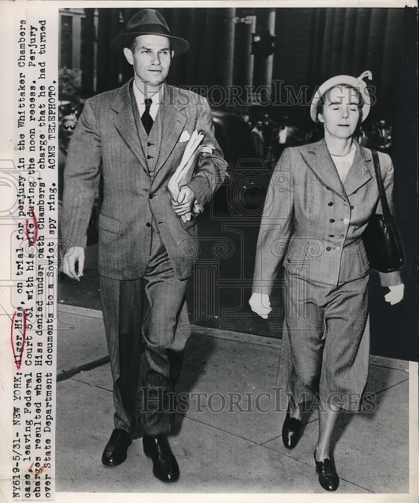 1949 Press Photo Alger Hiss, on trial for perjury, with his wife, leaving court - Historic Images