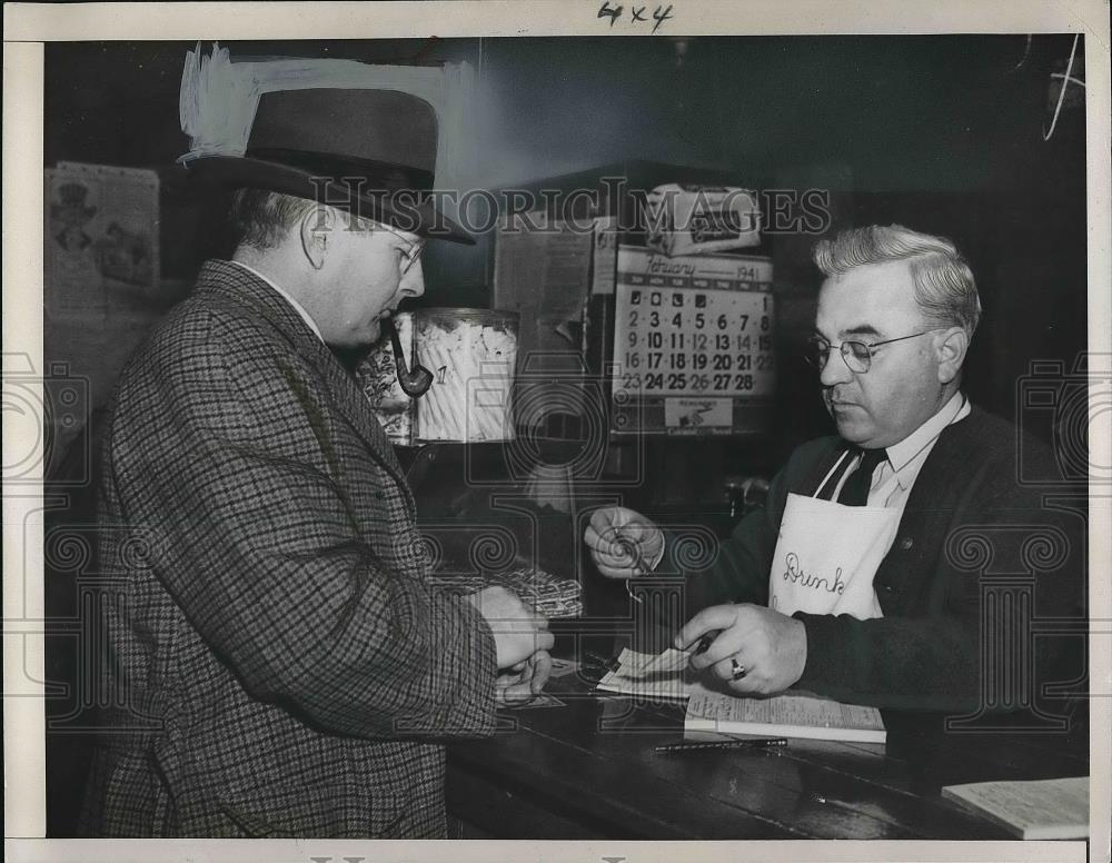 1941 Press Photo A Man Obtaining his Fishing License - neb09082 - Historic Images