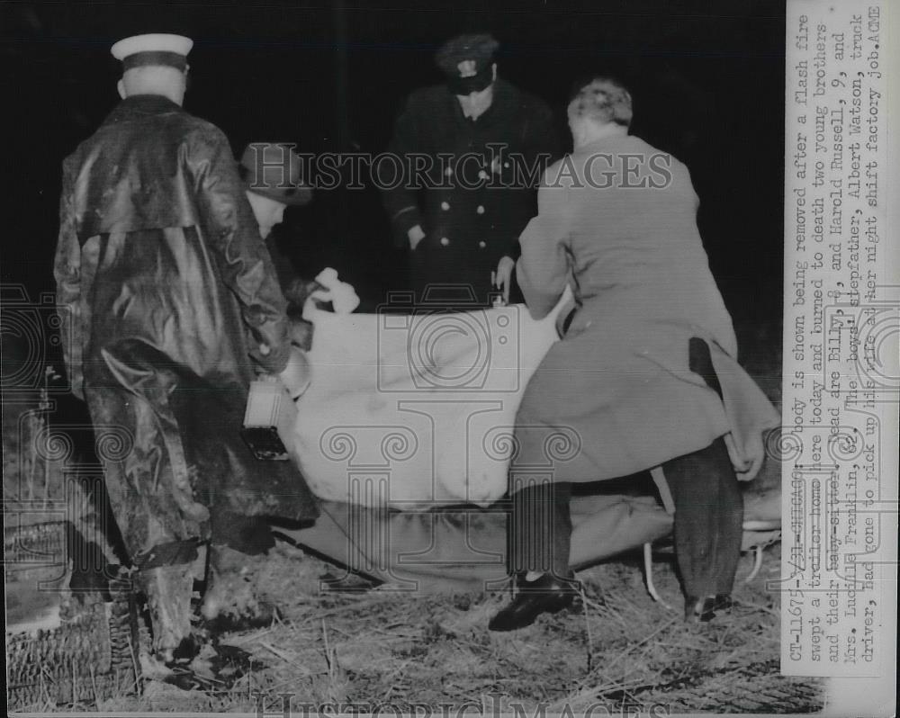 1951 Press Photo Body removed from Trailer after Flash fire - nea87863 - Historic Images