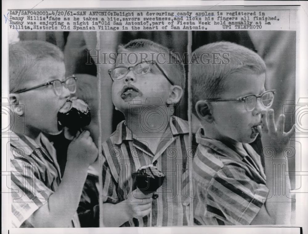 1961 Press Photo Young Danny Hillis eating candy apple - Historic Images