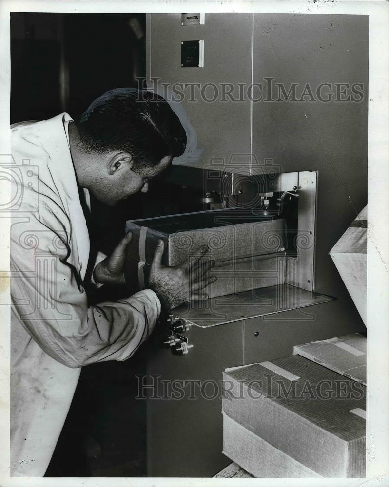 1967 Press Photo Johnson &amp; Johnson Co tape dispenser demonstrated - neb09577 - Historic Images