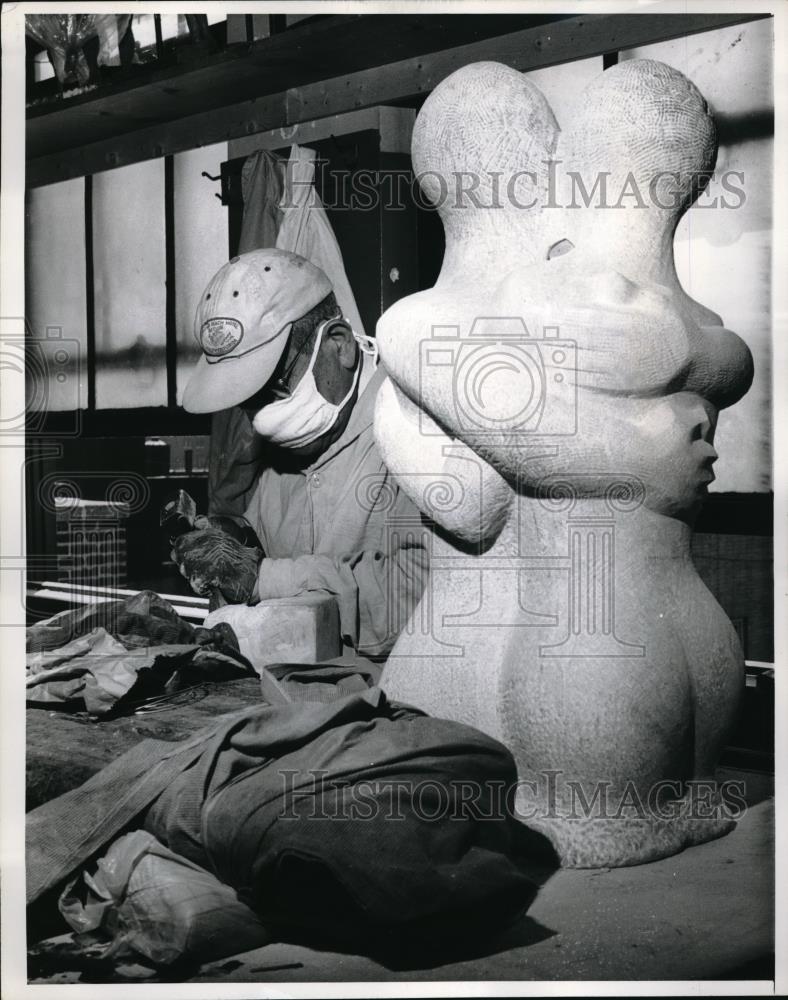 1964 Press Photo Dr David A Gotnick works on stone sculpture - Historic Images