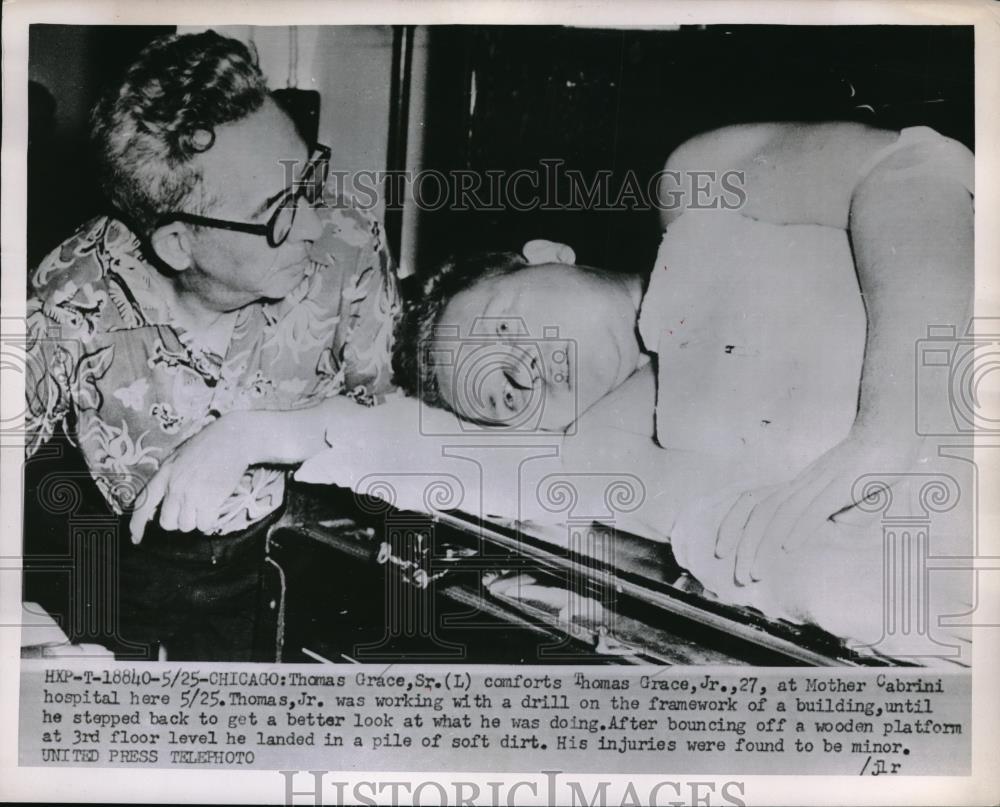 1953 Press Photo Thomas Grace Sr. Comforts Thomas Grace Jr. After Injury Working - Historic Images