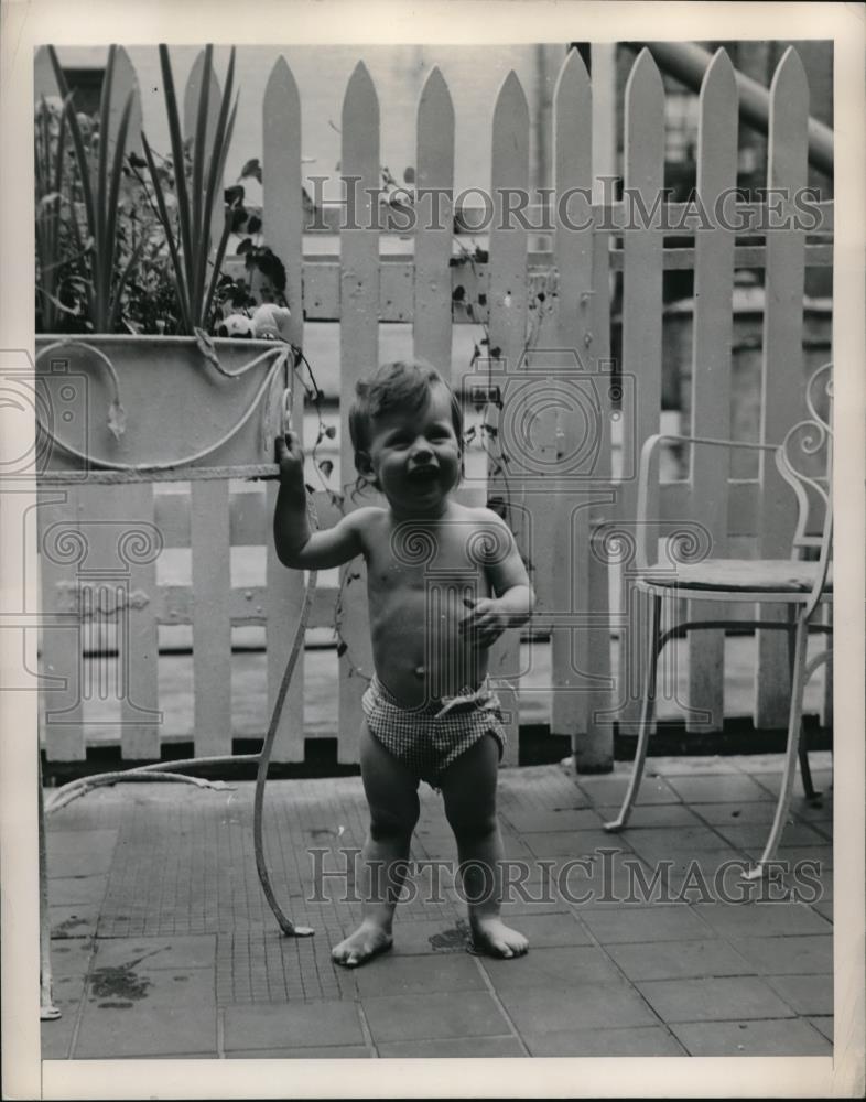 1937 Press Photo Baby standing next to a planter - Historic Images