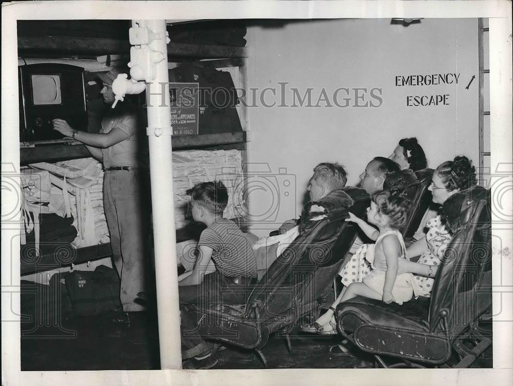 1948 Press Photo Jimmy Thompson Part of Deep Sea Fishing Crew Adjusts TV - Historic Images