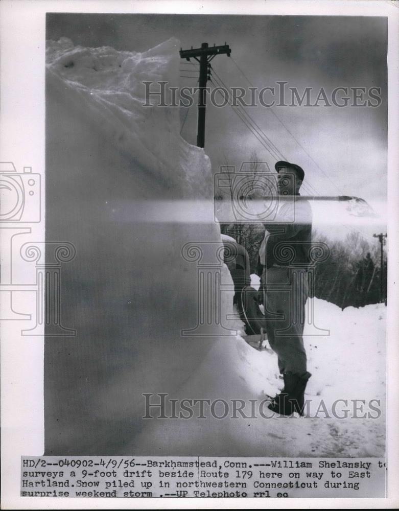 1956 Press Photo William Shelansky Surveys 9-Foot Snow Drift in Barkhamstead - Historic Images