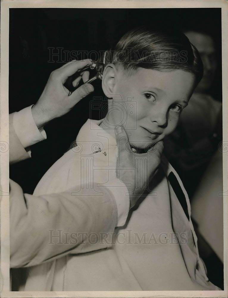 1936 Press Photo Boy getting a haircut - Historic Images