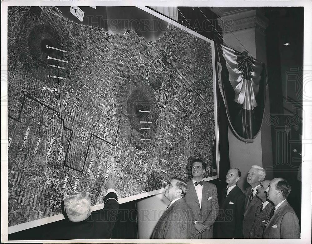 1950 Press Photo Fire Marshall Anthony Mullaney Shows Possible Bomb Targets - Historic Images