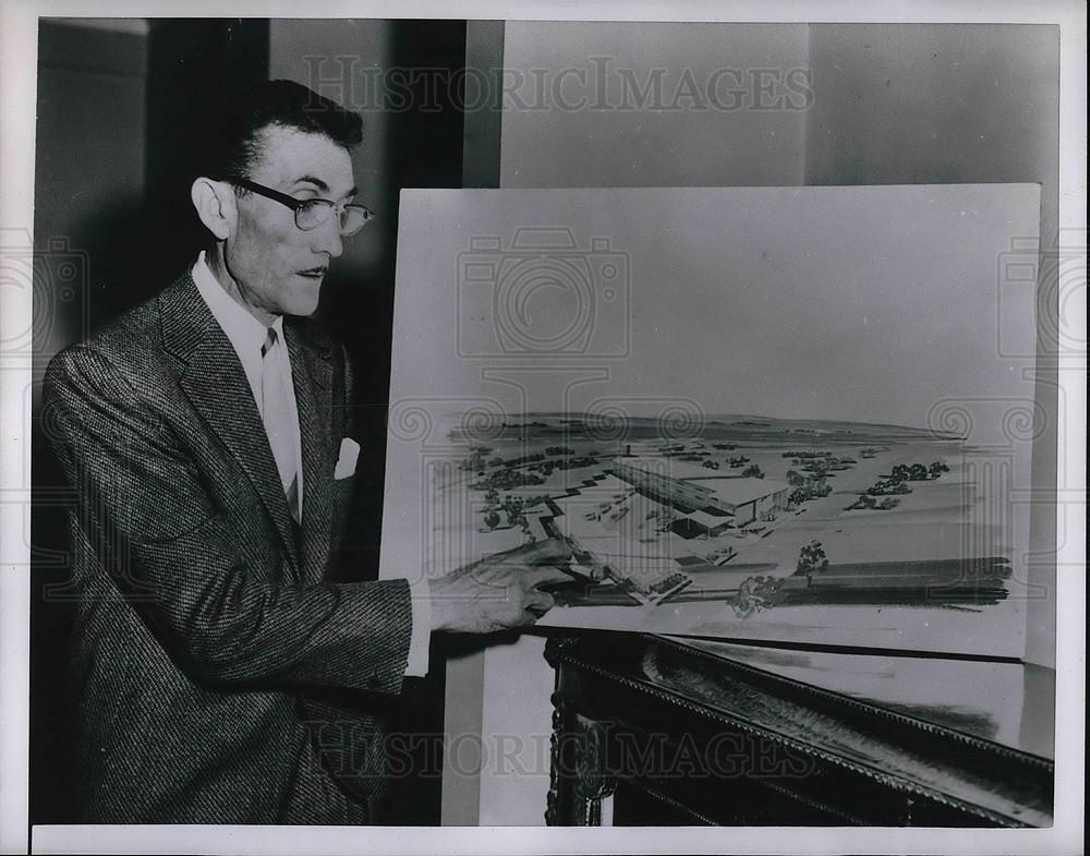 1953 Press Photo A man with a drawing of a school building. - Historic Images