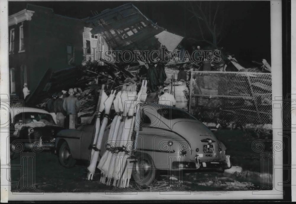 1959 Press Photo Stretchers Lean Against Car as Rescue Searches Tornado Hit Home - Historic Images