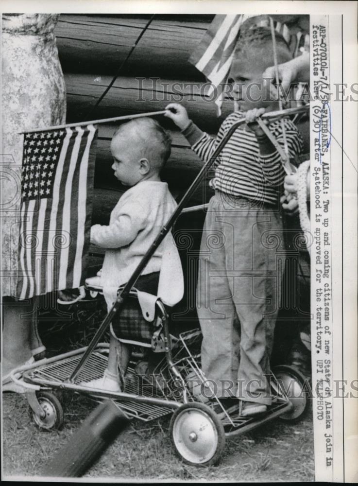 1958 Press Photo Two children celebrate in Fairbanks Alaska over statehood - Historic Images