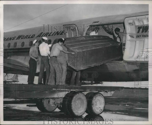 1951 Press Photo Coast Guardsmen Unload 13 Ft Punt at Forbes AFB - neb52419 - Historic Images