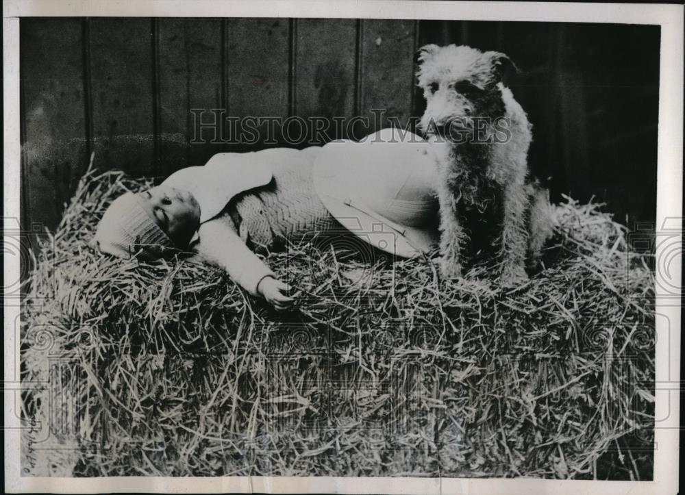 1938 Press Photo Pet Terrier Dog Watches over Eight Month Old Ralph Goodwin - Historic Images