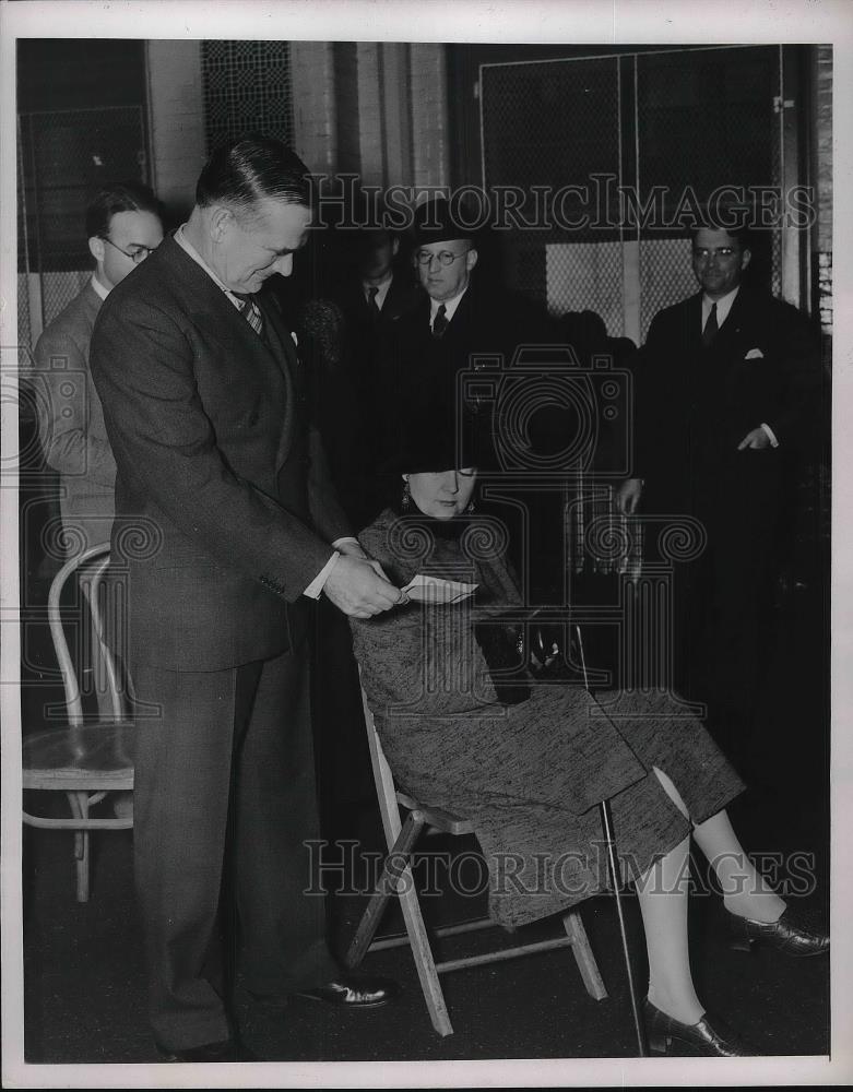 1937 Press Photo J Mahoney Shows His Wife How The Tickets Will Look - Historic Images