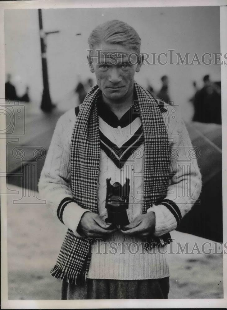 1934 Press Photo James Alying with carved good luck Budha - neb52075 - Historic Images