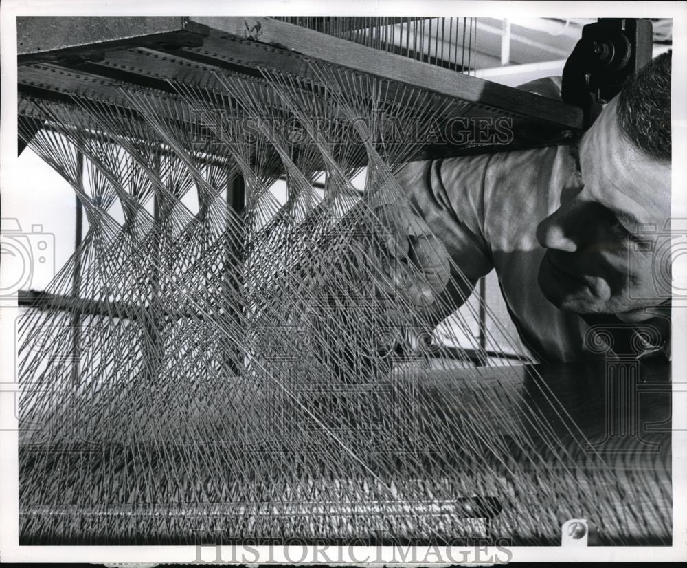 1962 Press Photo Goodyear Aircraft Corp in Akron, Ohio, harness cords adjusted - Historic Images