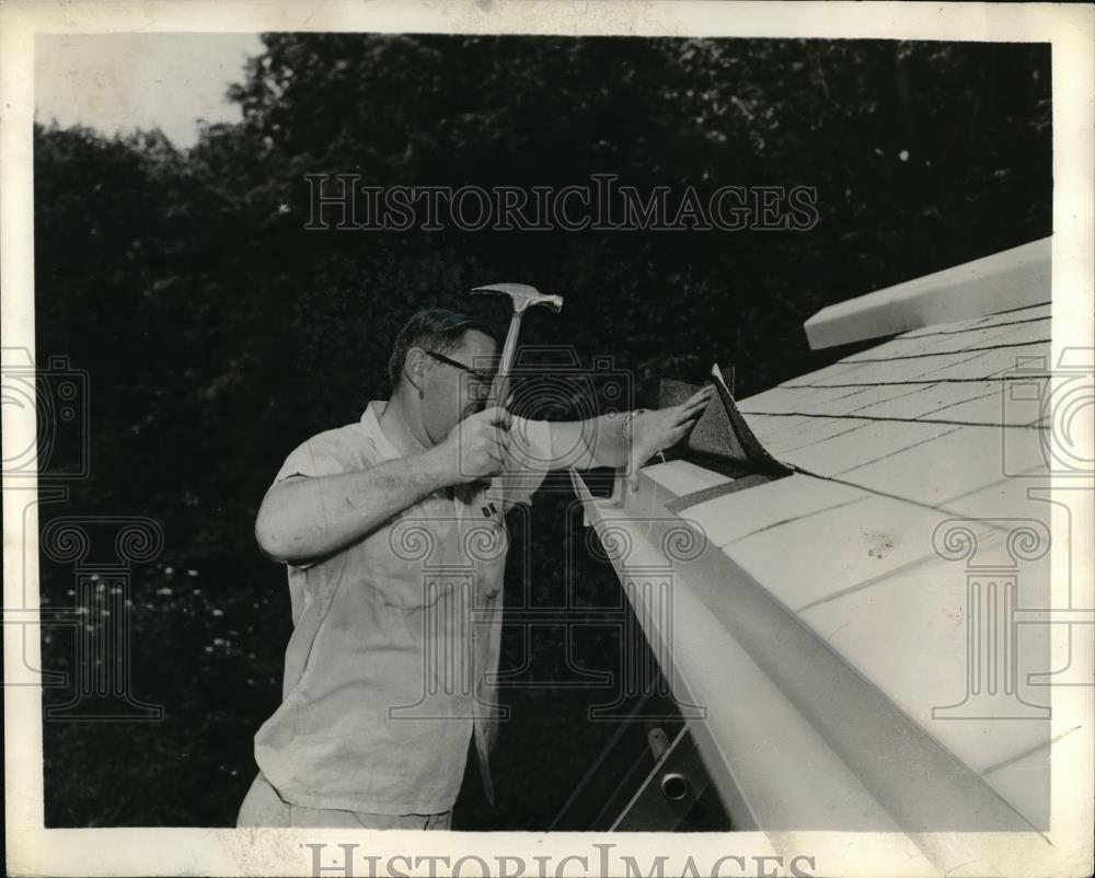 1959 Press Photo Man Hammers New Shingles In Place On Roof - neb51493 - Historic Images