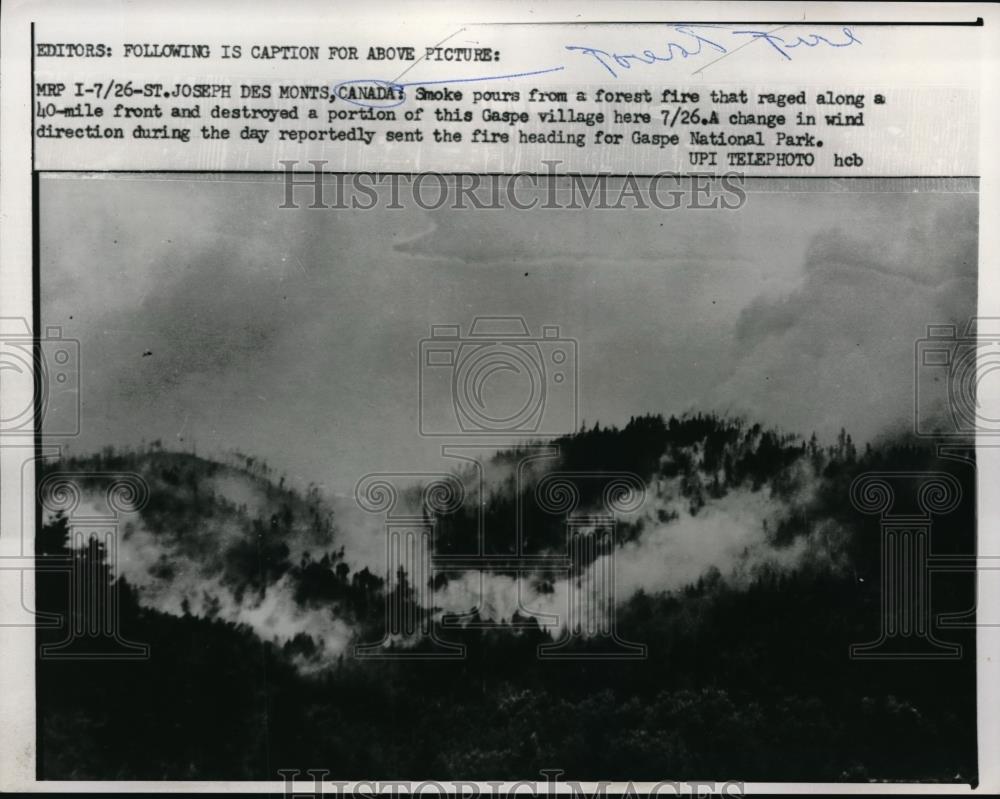 1959 Press Photo Smoke Pouring From Forest Fire Destroying Gaspe Village, Canada - Historic Images