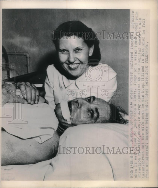 1949 Press Photo R. Norton In hospital after making 100 ft jump - Historic Images