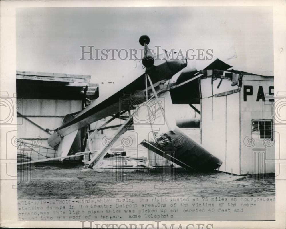 1949 Press Photo Detroit Storm Causes Damage to a Light Plane. - Historic Images