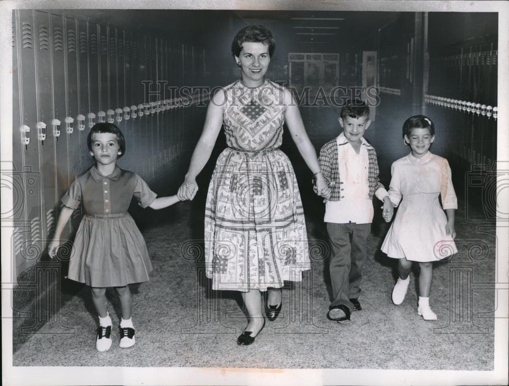 1959 Press Photo Children with an Adult Walk a School Hallway - Historic Images