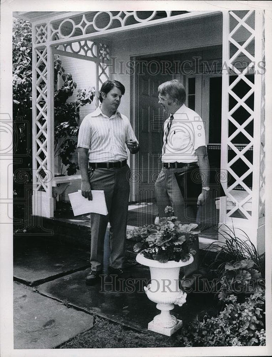 Press Photo Two Men Outside Entrance of a Home - Historic Images