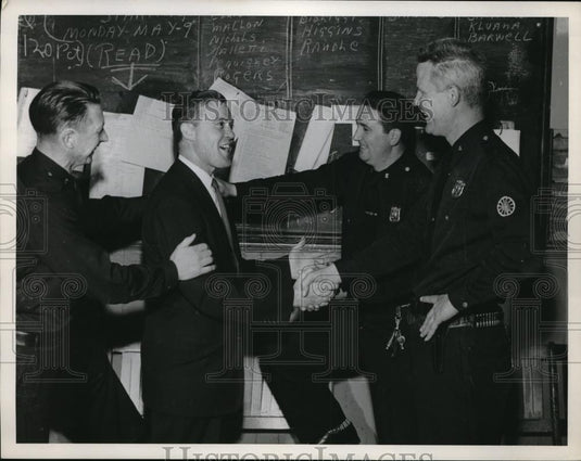 1955 Press Photo Redmond O'Houhan Greeted by Two Policemen - Historic Images
