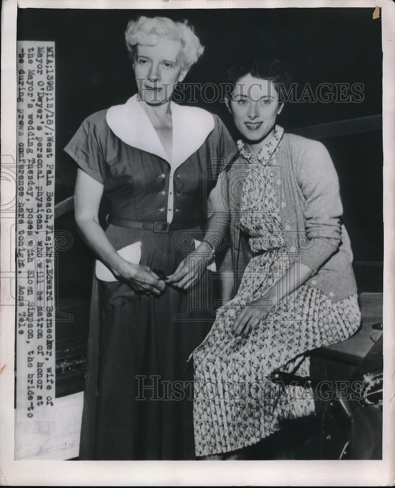 1949 Press Photo Bride to be and Matron of Honor preparing for mayoral wedding - Historic Images