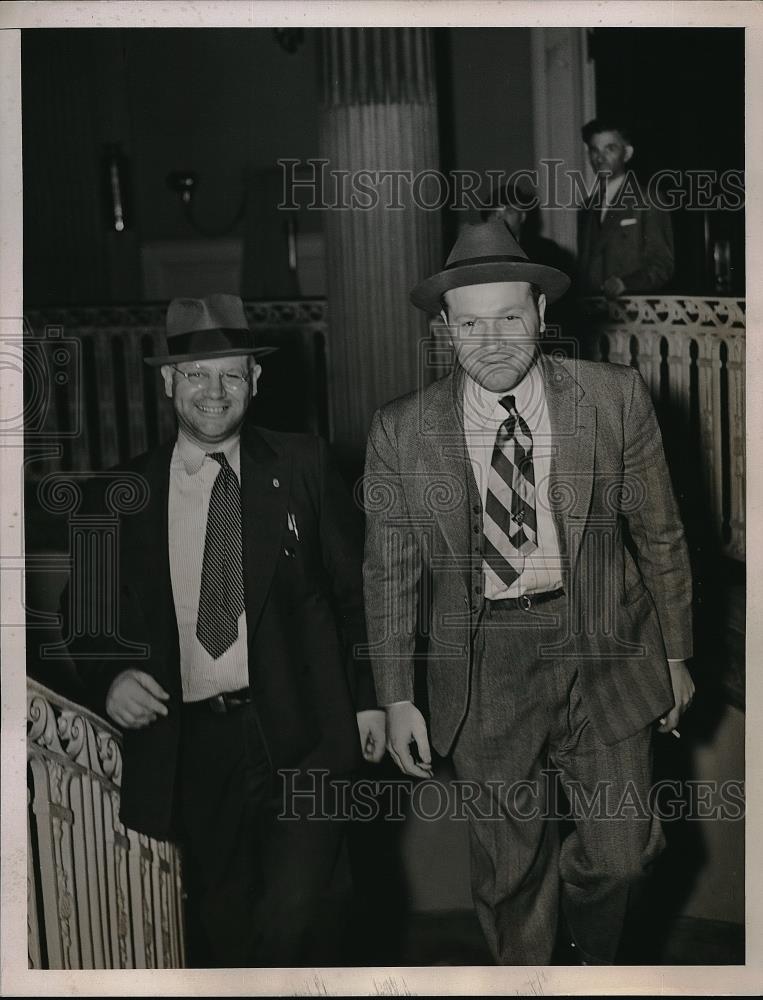 1938 Press Photo Two members on the Union of Striking Truck Drivers walk out. - Historic Images