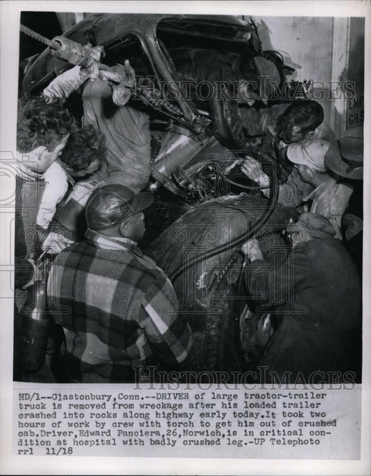 1955 Press Photo Glastonberry,Conn. Ed Panciera pulled from semi accident - Historic Images