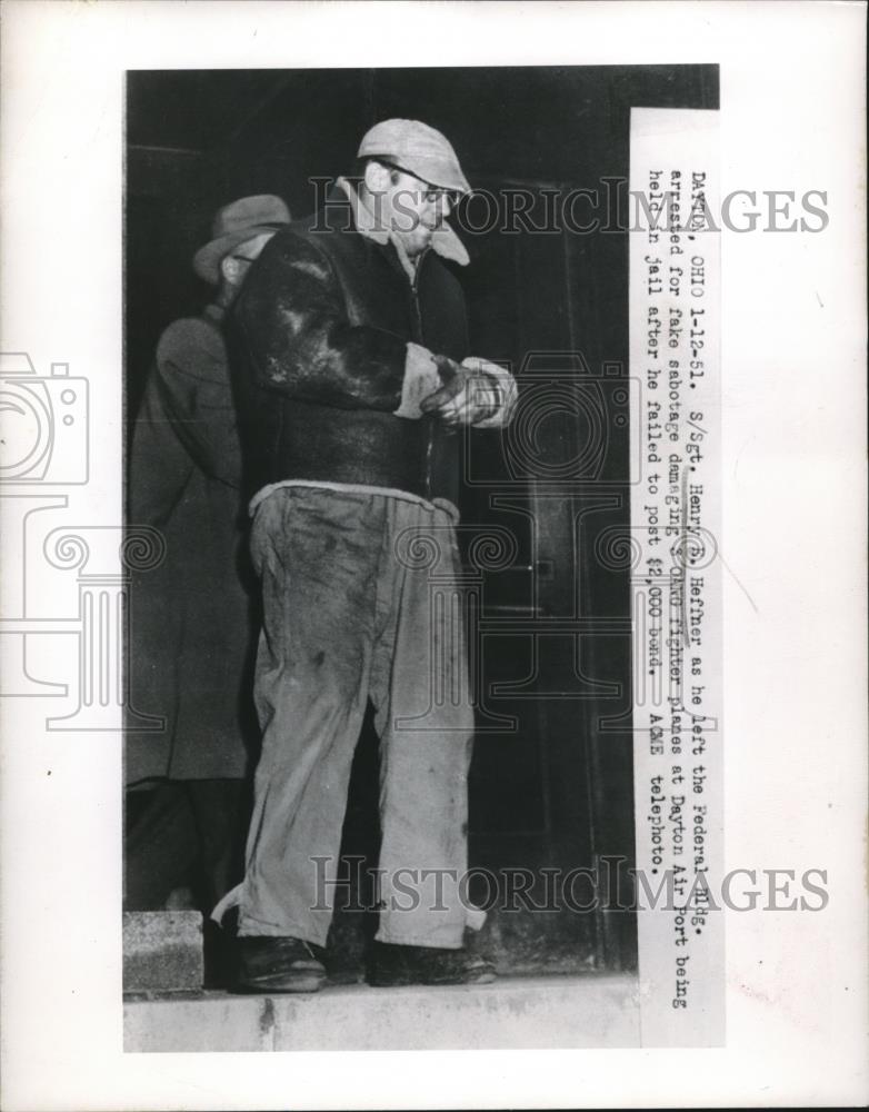 1951 Press Photo S/Sgt Henry Heffner arrested for fake damage to fighter plane - Historic Images