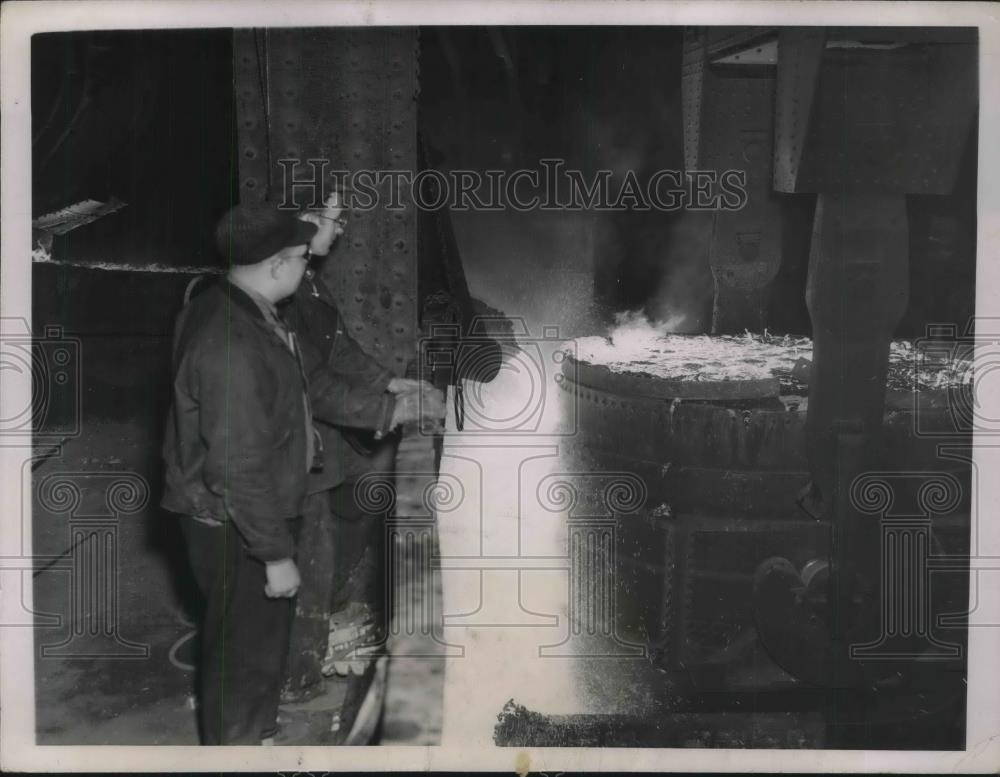 1937 Press Photo Republic Steel Workers Watch Slag Poured From Vat - neb58529 - Historic Images