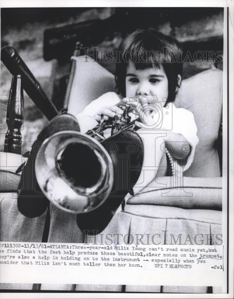 1961 Press Photo Miliz Young, 3, plays the trumpet - Historic Images