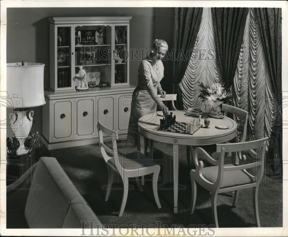 1959 Press Photo A woman setting the dinner table in a dining room - neb65571 - Historic Images