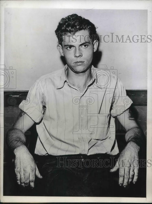 1942 Press Photo Richard Leroy in questioned in for "Red Circle"Murders. - Historic Images