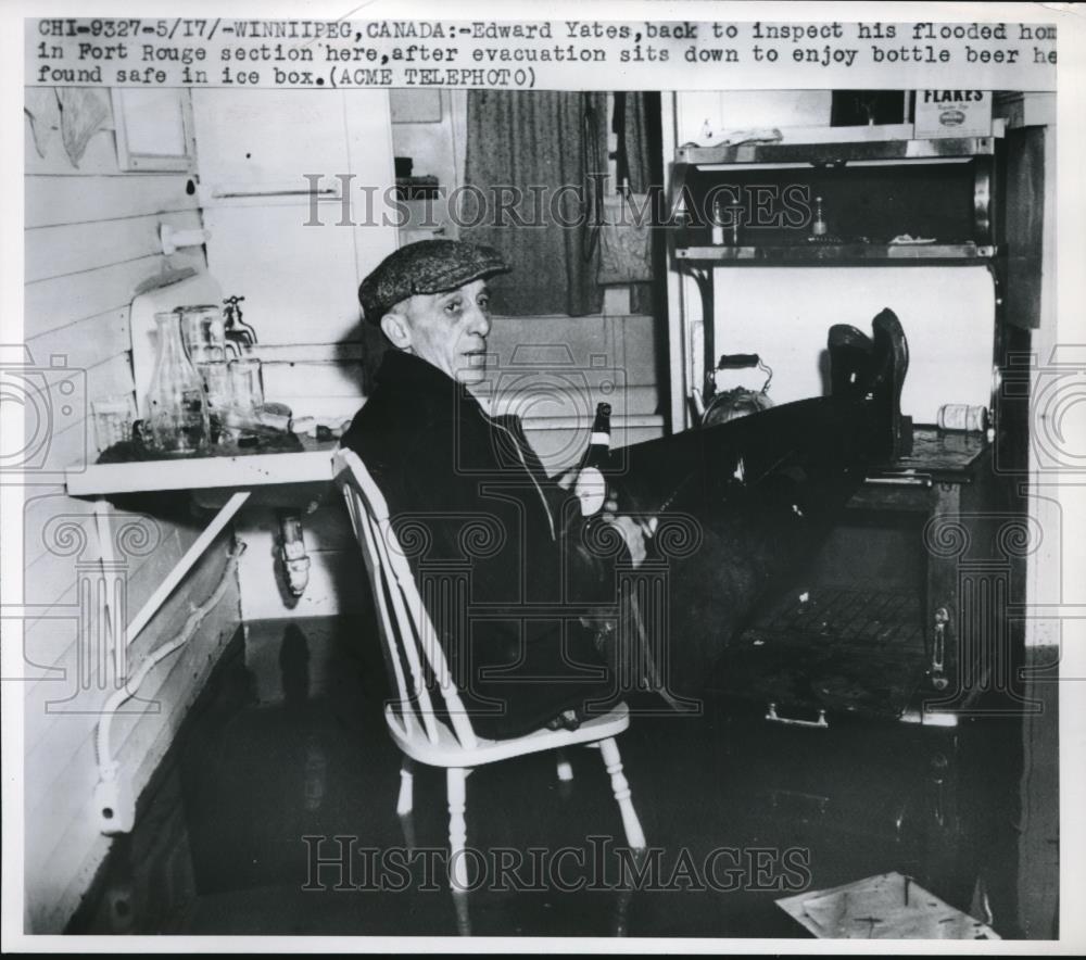 1950 Press Photo Winnipeg, Canada, Edward Yates in his flooded home - neb65938 - Historic Images