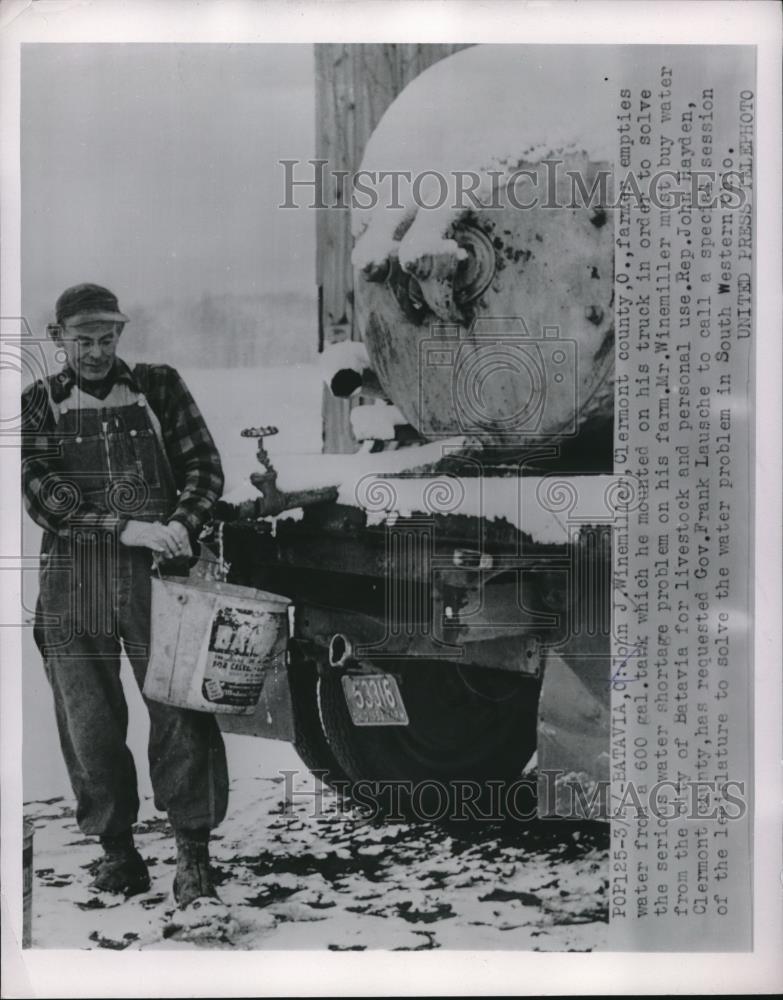 1954 Press Photo John J. Winemiller, Clermont Co.Farmer Empties Water From Tank - Historic Images