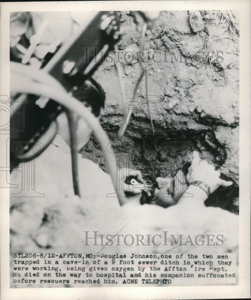 1948 Press Photo Firefighter rescuing Douglas Johnson after cave in at Affton Mo - Historic Images