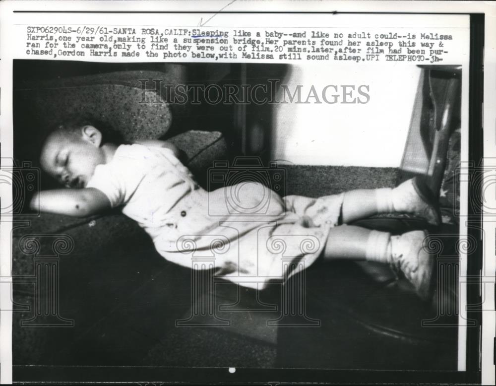 1961 Press Photo Santa Rosa, Calif. Melissa Harris, baby sleeping suspened - Historic Images