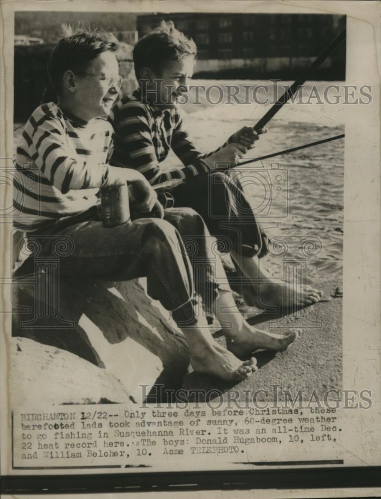 1949 Press Photo boys enjoy fishing in record warm weather for December - Historic Images