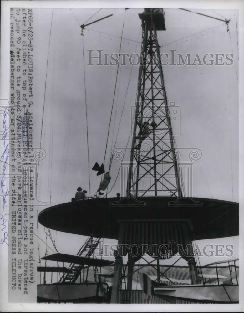 1954 Press Photo Robert Adelsberger Lowered From Tower In Rescue Basket - Historic Images