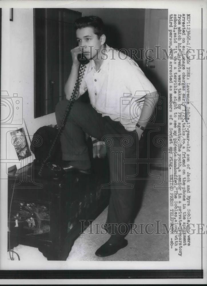 1957 Press Photo Lawrence Soble on the phone after his parents arrest by FBI - Historic Images