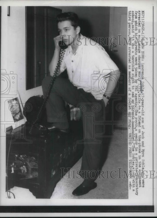 1957 Press Photo Lawrence Soble on the phone after his parents arrest by FBI - Historic Images