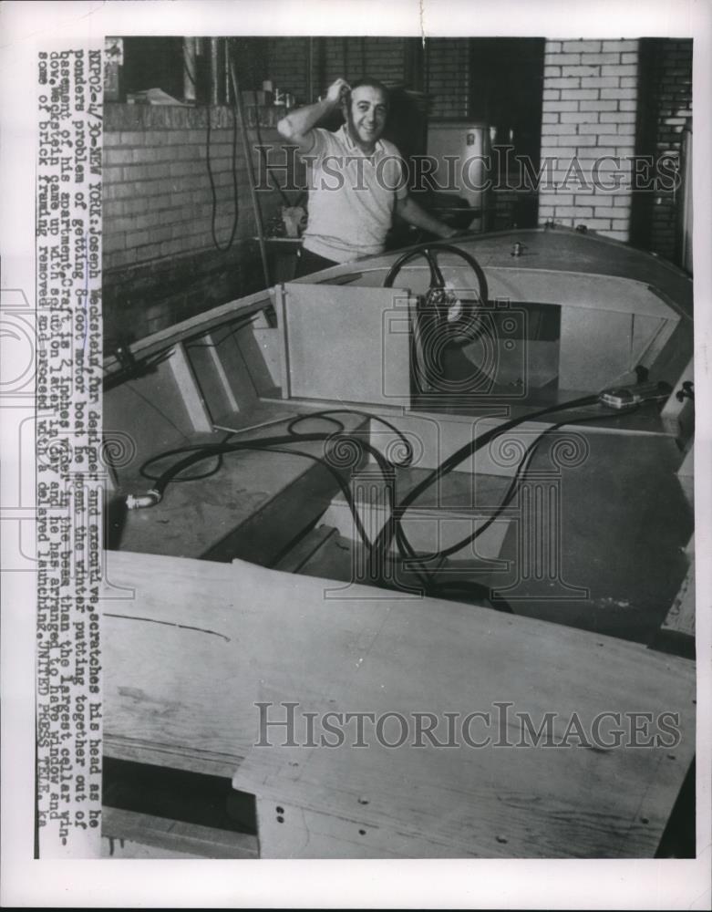 1955 Press Photo New York&#39;s Joseph Weckstein Ponders Boat-In-Basement Problem - Historic Images