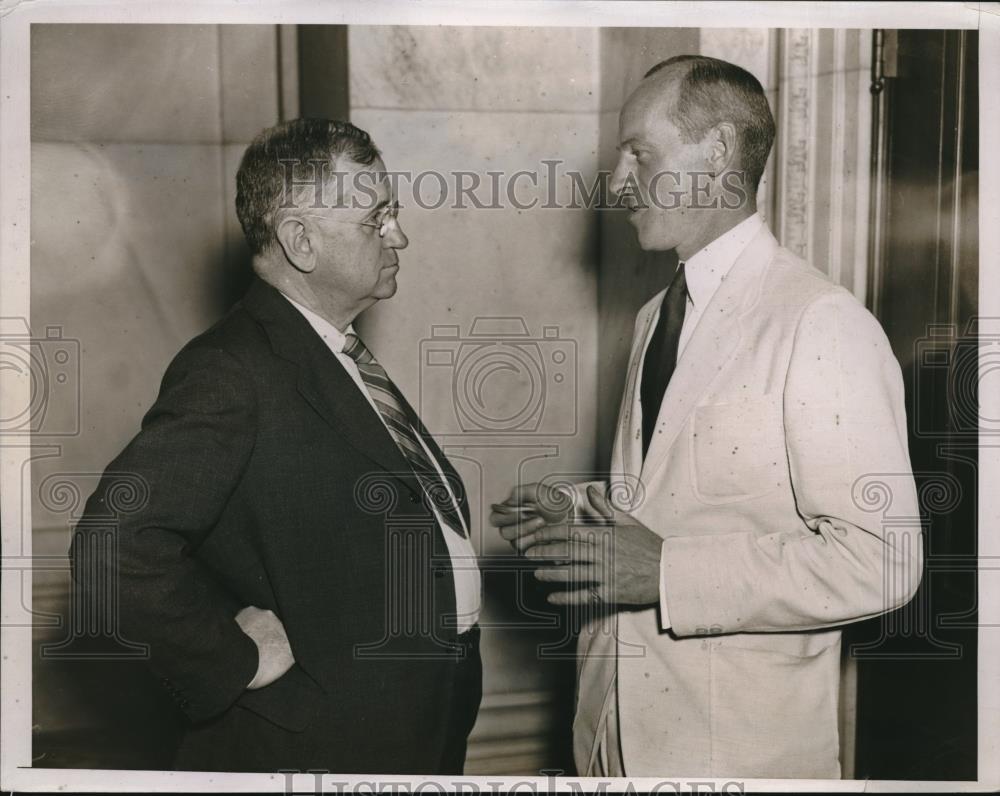 1935 Press Photo Secretary of Interior Harold Ickes speaking with Senator - Historic Images