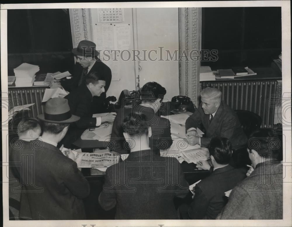 1937 Press Photo Government official at meeting after sinking of Gunboat - Historic Images
