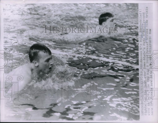 1963 Press Photo Lincoln, Neb Ks U's Bill Murdock vs IA U's Pete O'Kelly, swim - Historic Images