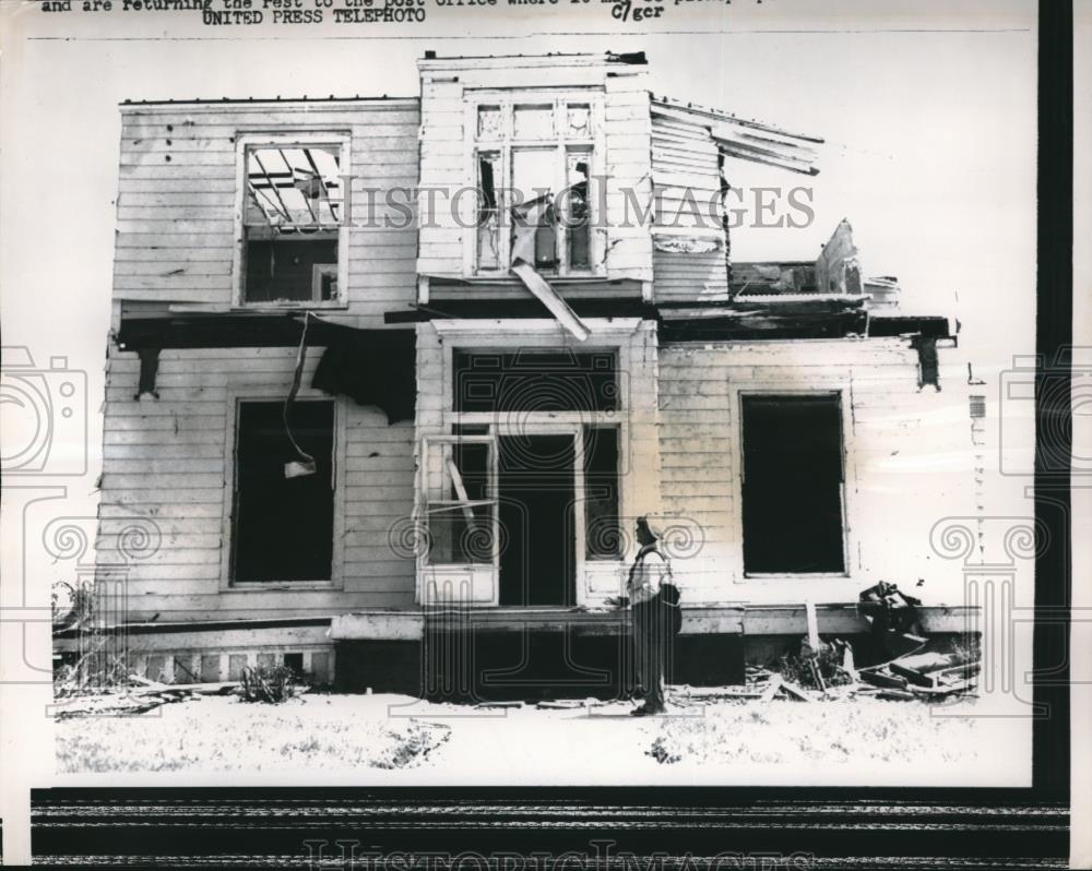 1957 Press Photo Moorhead, postman M Wilhelm at home hit by tornado - Historic Images