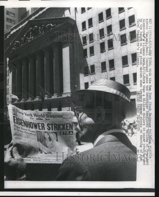 1957 Press Photo NYC, NYSE building & Basil Constant reads news headlines - Historic Images